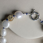 Parel armband met zilveren sluiting