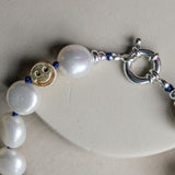 Parel armband met zilveren sluiting