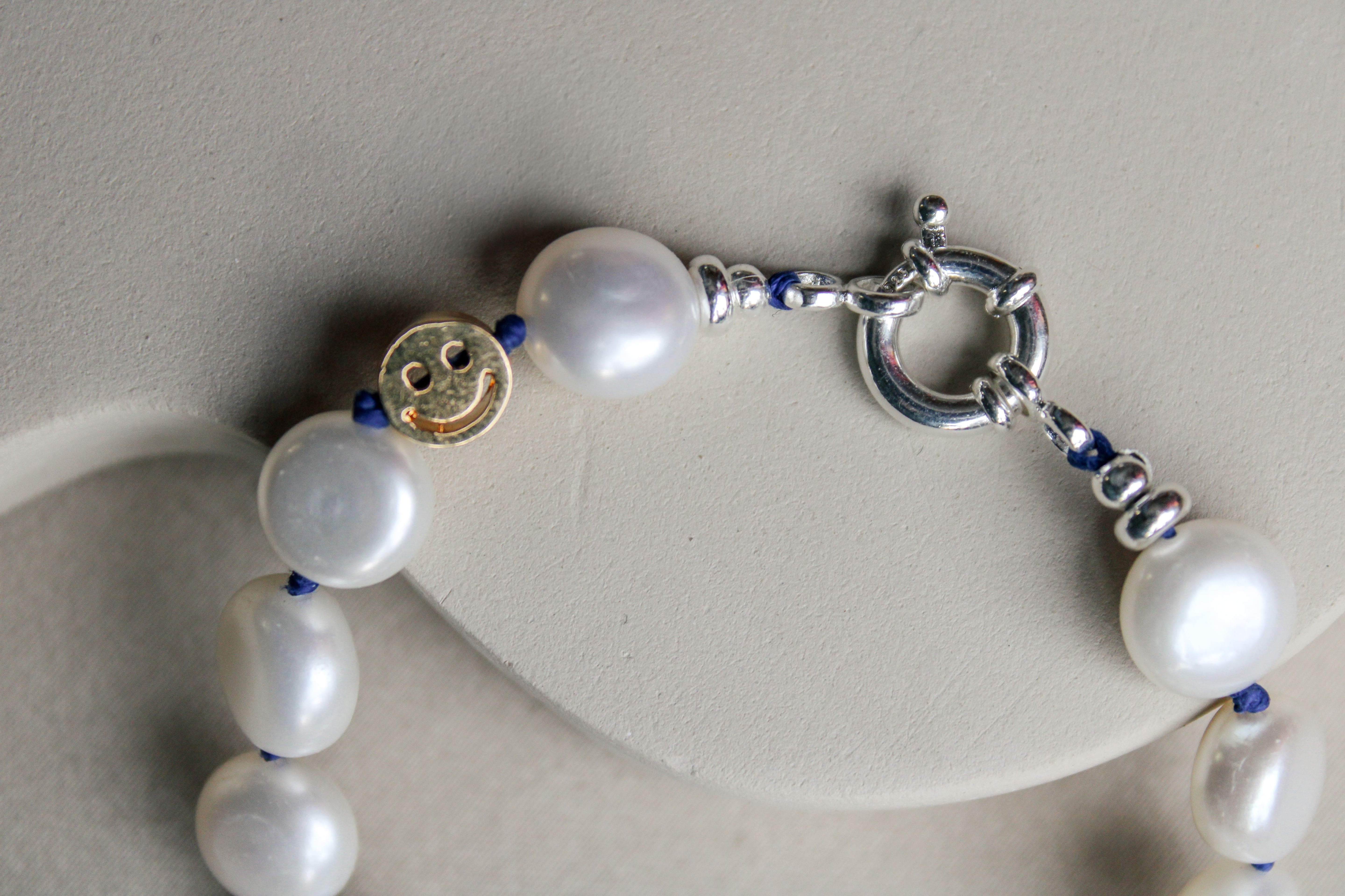 Parel armband met zilveren sluiting