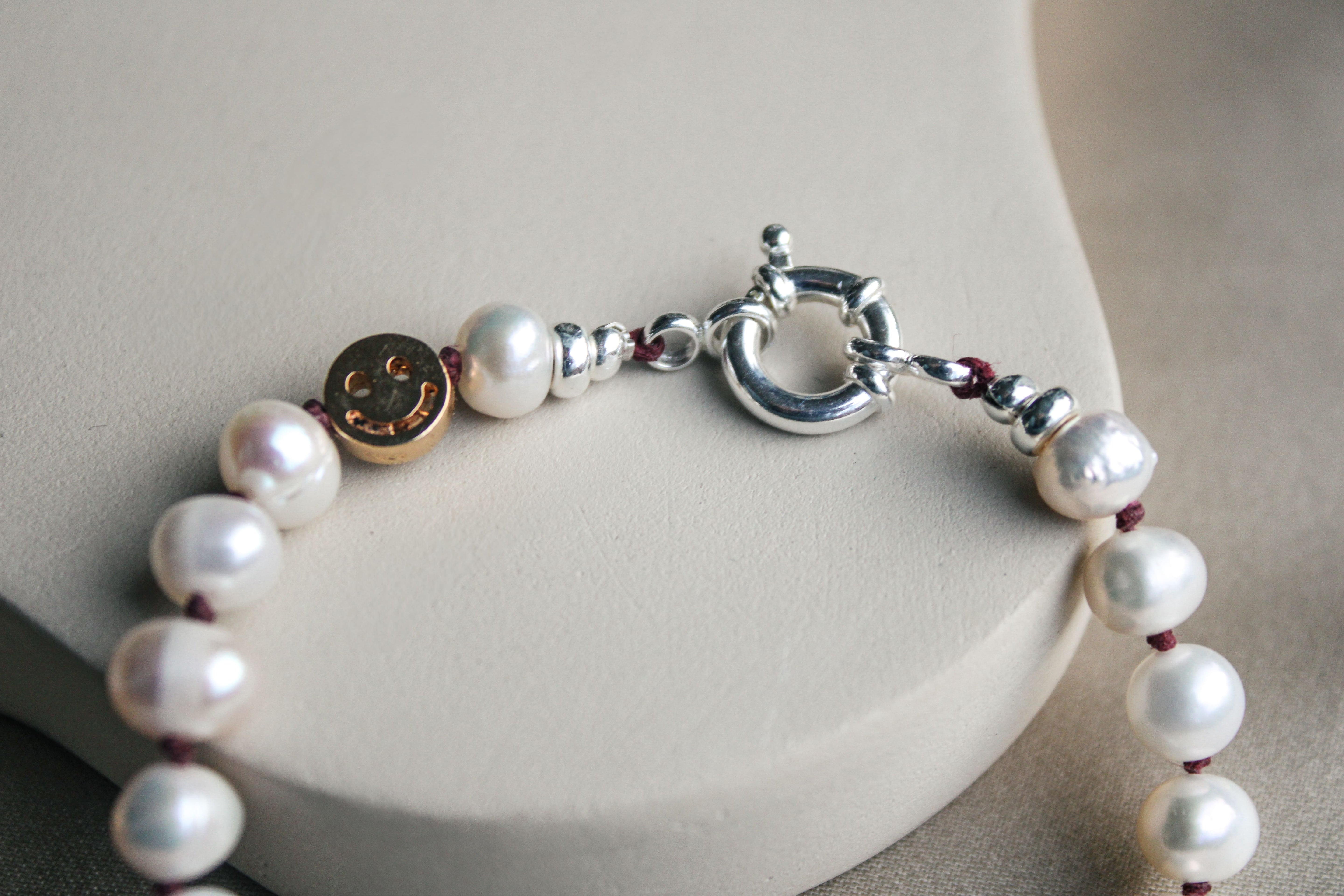 Parelarmband met zilveren sluiting