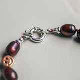 Burgundy parel armband met zilveren sluiting